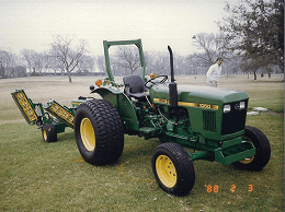 Group of people at ribbon-cutting ceremony outdoors