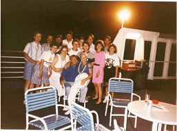 Group in front of building with John Deere and 4Rivers Equipment logos