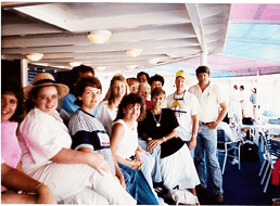 Group of people at ribbon-cutting ceremony outdoors